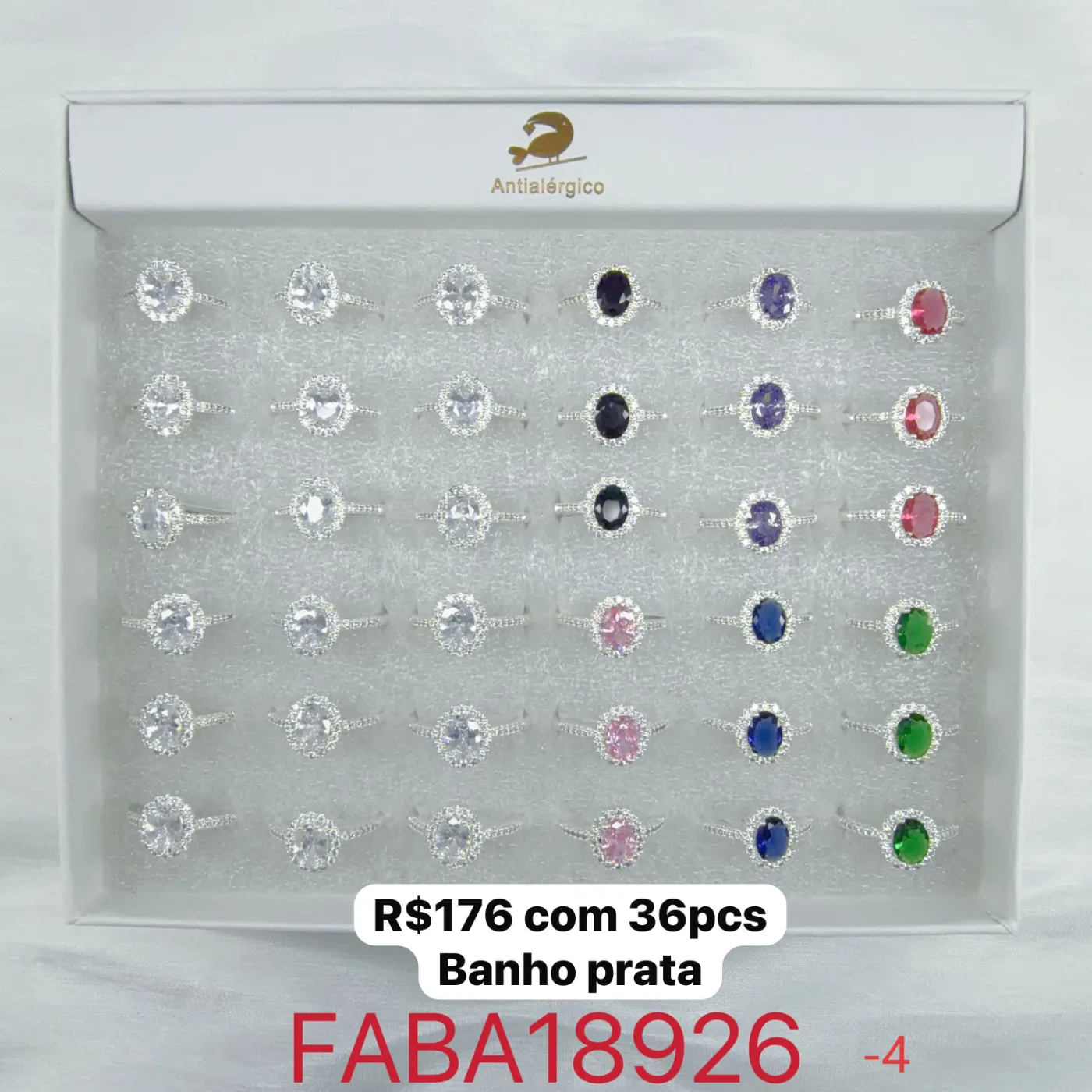 anel oval com pedra colorida e zircônias
